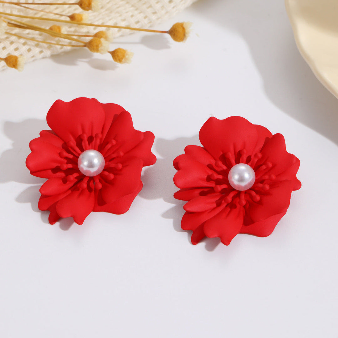 Ladies earrings with elaborate floral pattern Nin Boutique