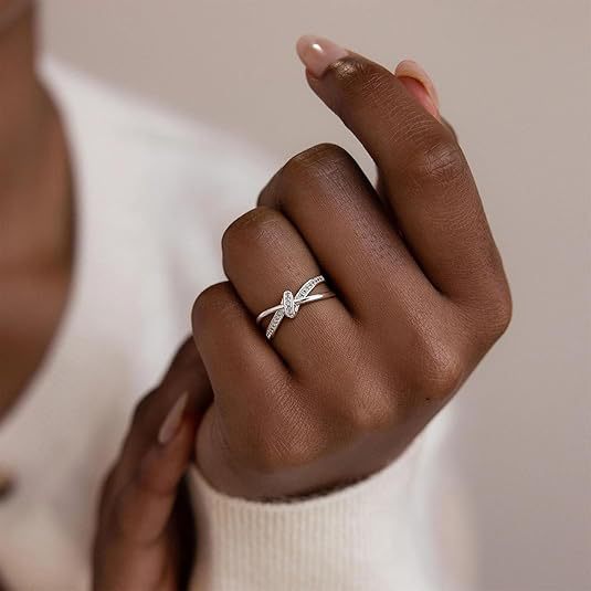 Women's functional ring with elegant cross design Nin Boutique