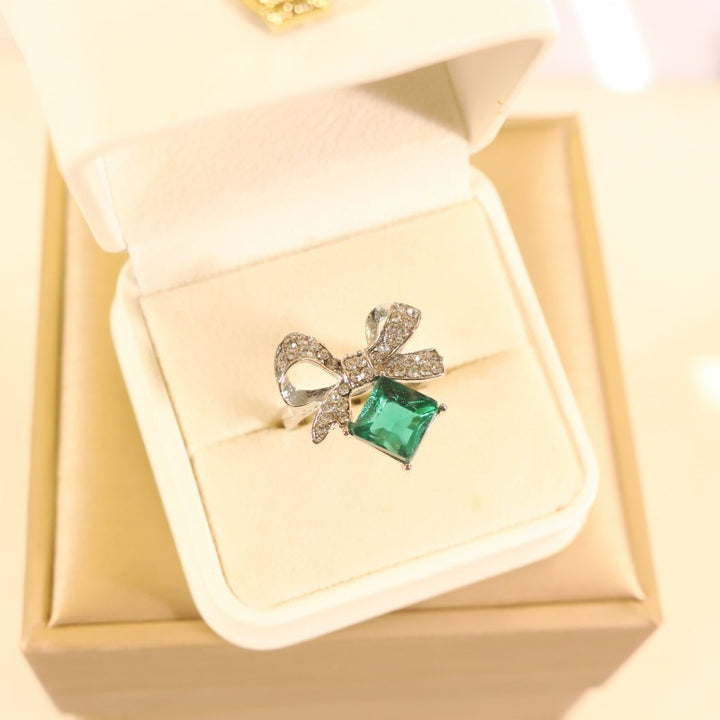 Women's vintage bow cocktail ring with square-cut gemstone simulant and pavé crystal accents Nin Boutique