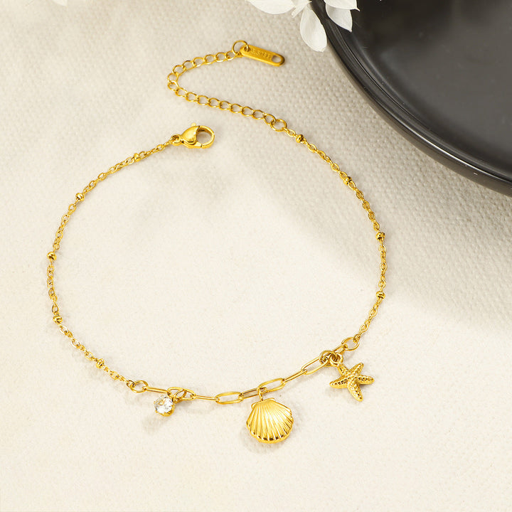 Women's ankle bracelet with playful shell and star pendants Nin Boutique