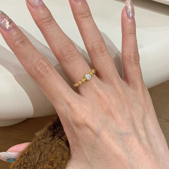 Women's ring with sparkling zircon and ball design Nin Boutique