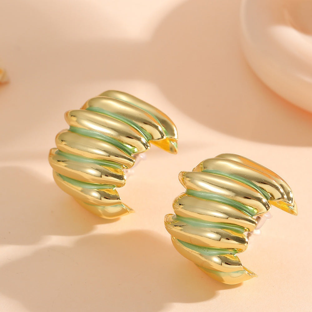 Ladies' jewelry earrings in elegant wave pattern Nin Boutique