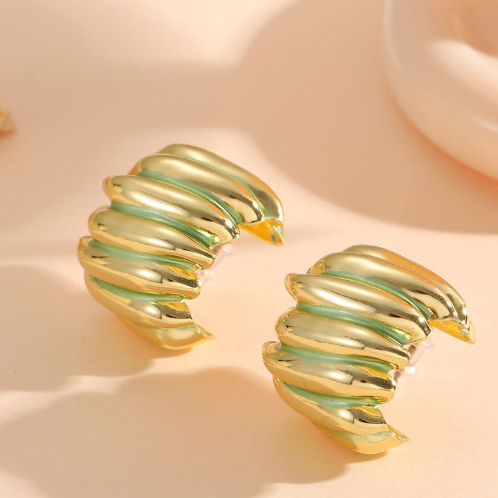 Ladies' jewelry earrings in elegant wave pattern Nin Boutique