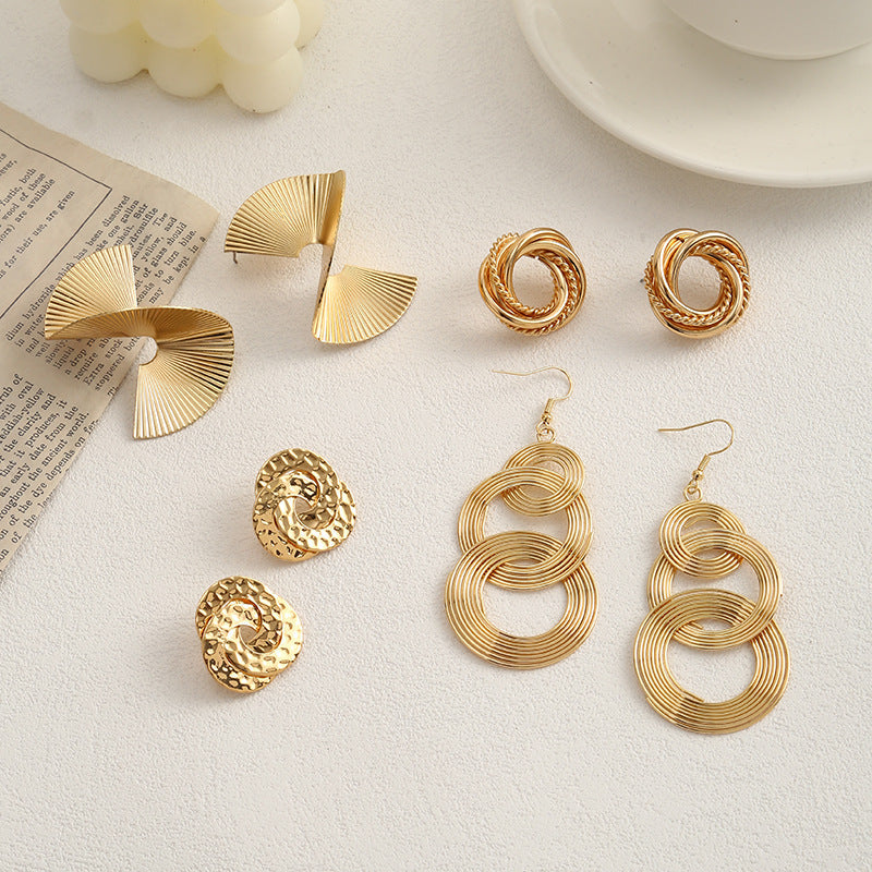 Ladies earrings with elaborate fan design Nin Boutique