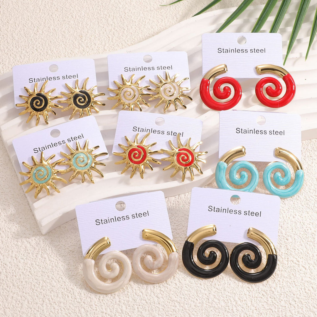 Ladies earrings in artistic sun motif Nin Boutique