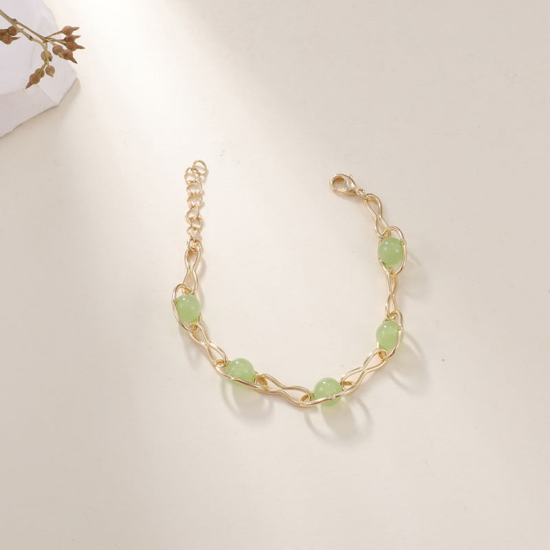 Ladies bracelet with intricately woven design and noble semi-precious stones Nin Boutique