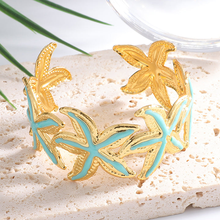 Women's Open Bangle with Striking Star Motif Nin Boutique
