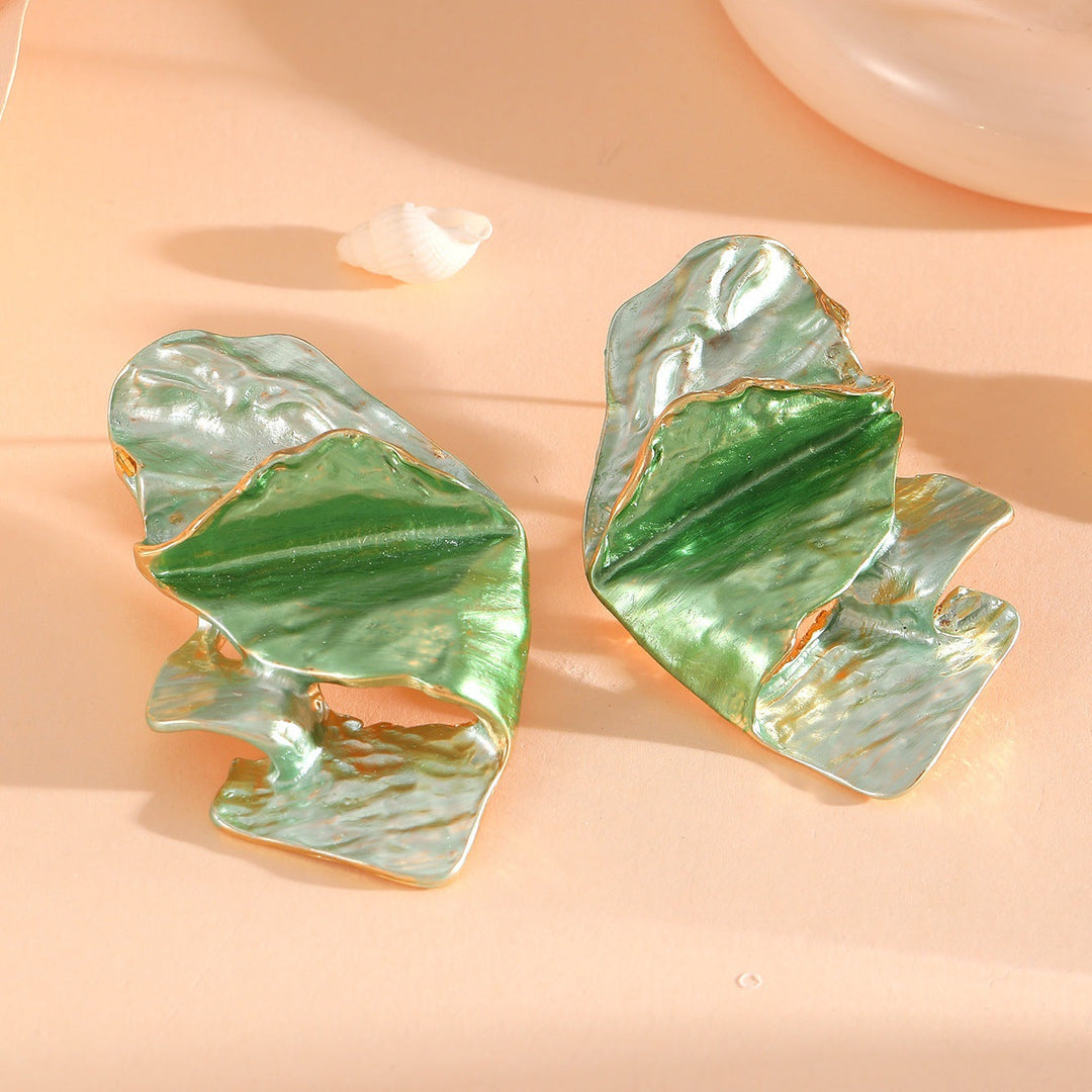 Ladies earrings in elaborate shell design Nin Boutique