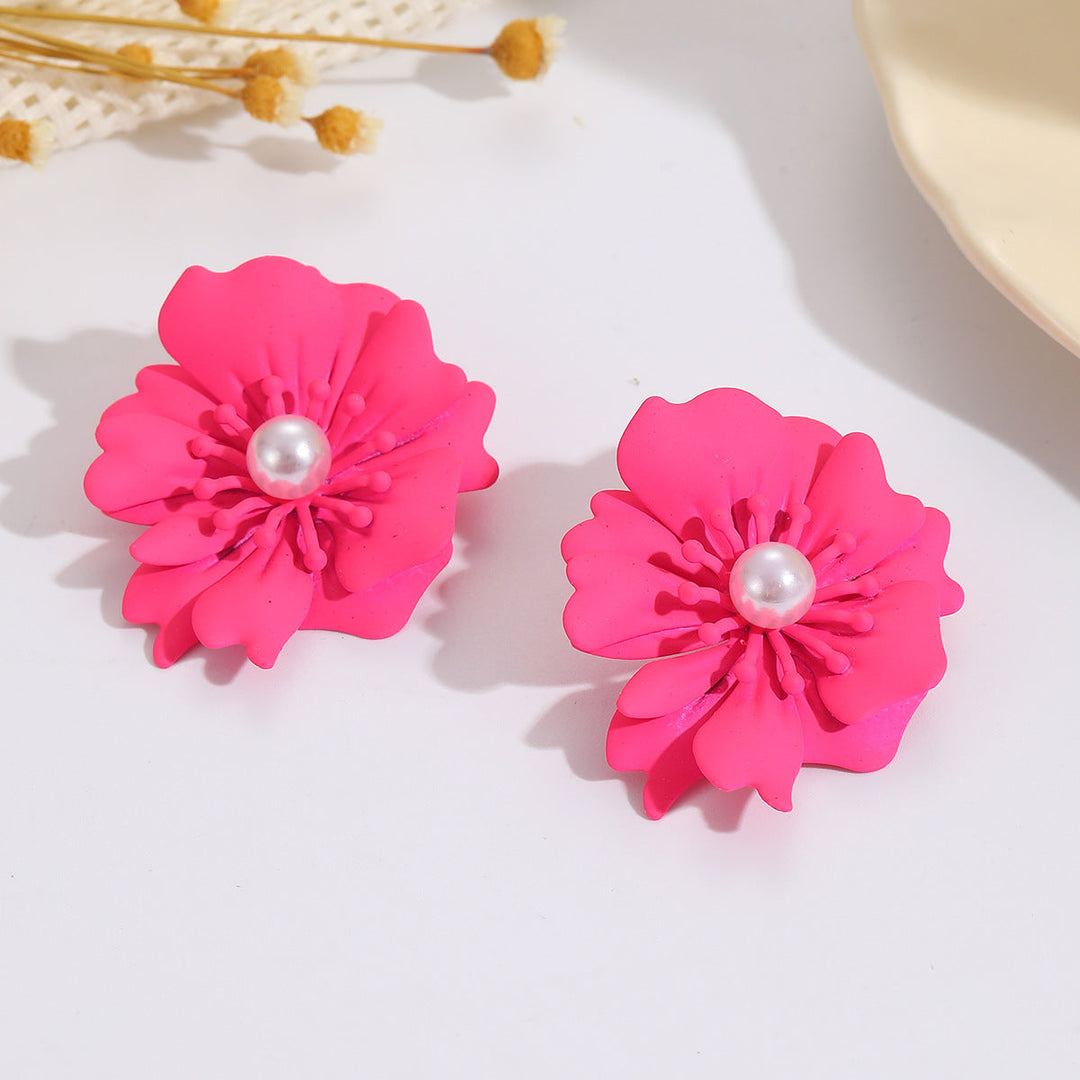 Ladies earrings with elaborate floral pattern Nin Boutique