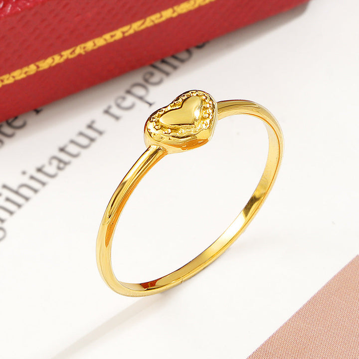 Ladies' delicate ring with heart-shaped design and sparkling accents Nin Boutique