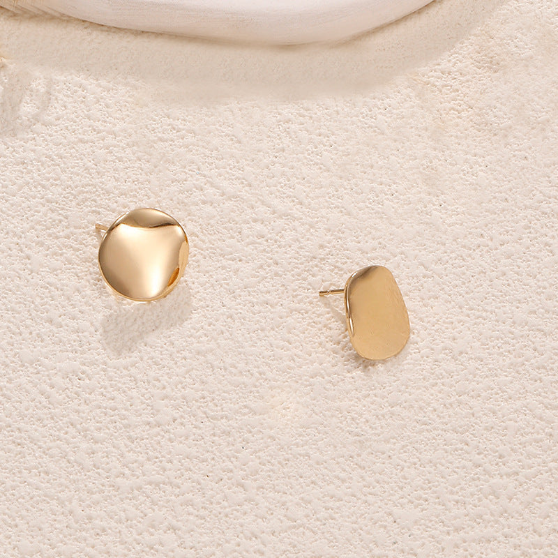 Ladies earrings in artistic face design Nin Boutique