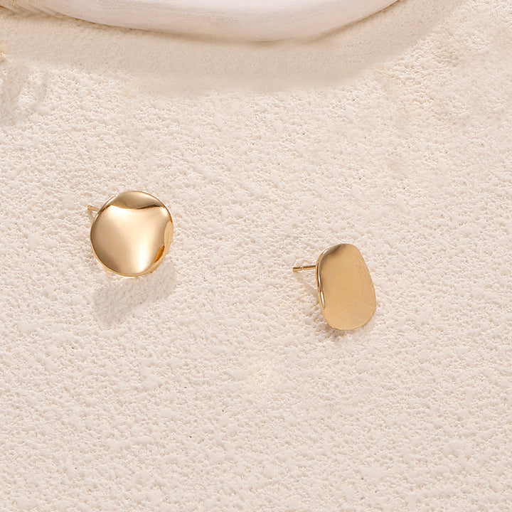 Ladies earrings in artistic face design Nin Boutique