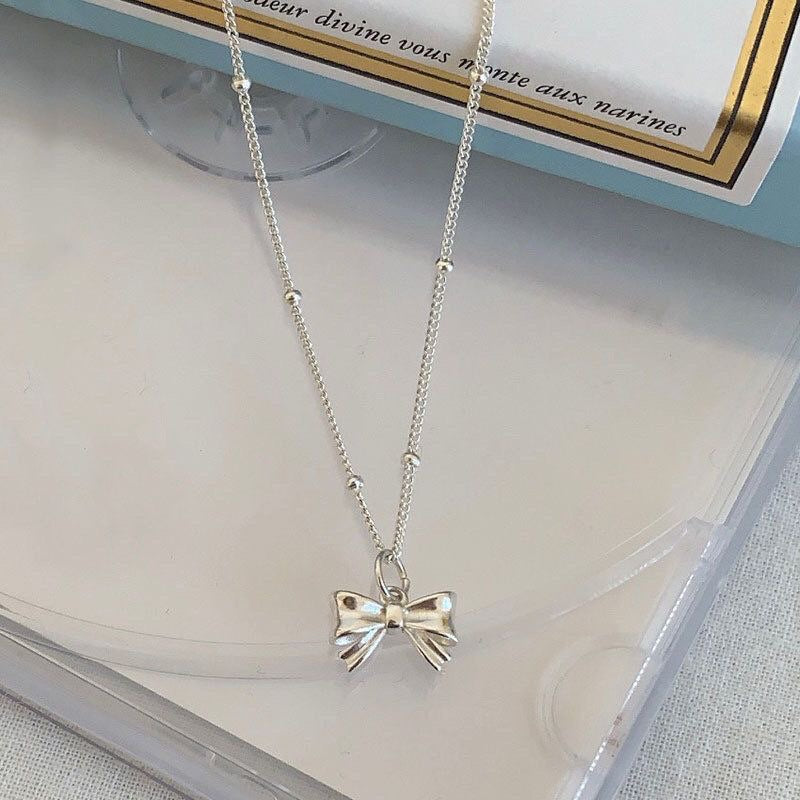 Ladies necklace with elegant bow pendant made of high-quality stainless steel Nin Boutique