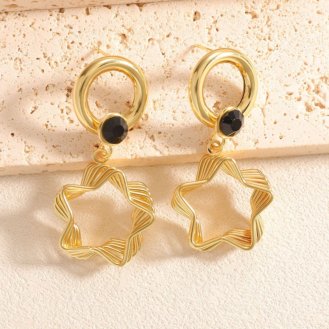 Ladies earrings with elaborate star design Nin Boutique