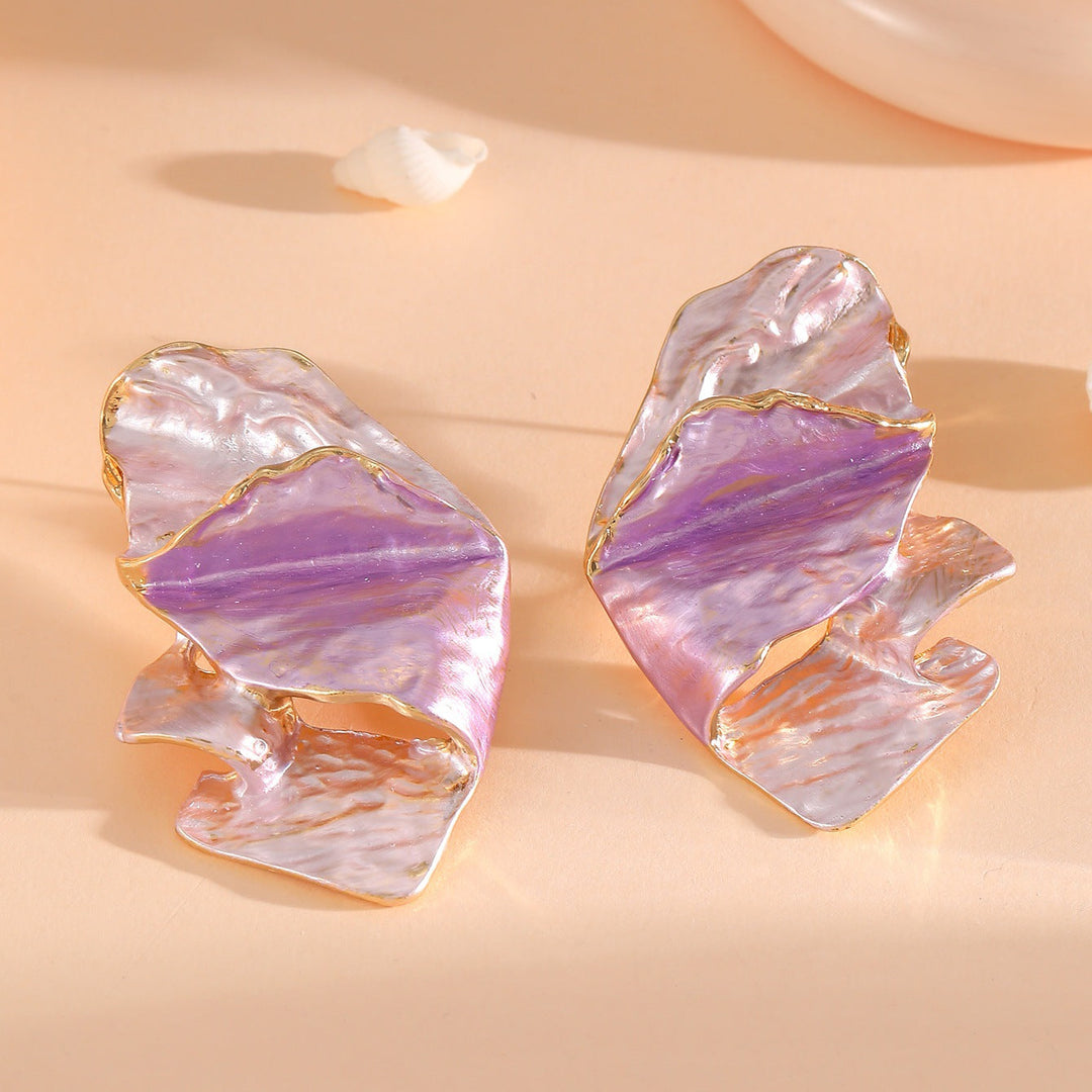 Ladies earrings in elaborate shell design Nin Boutique