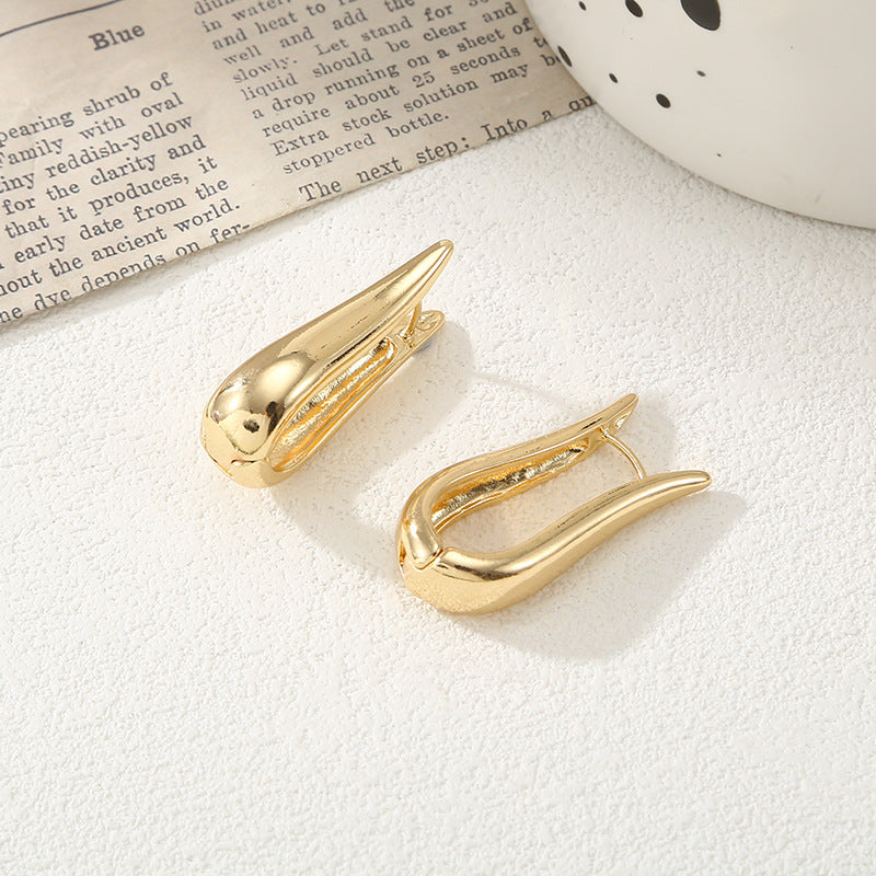 Women's earrings with elegant, curved design Nin Boutique