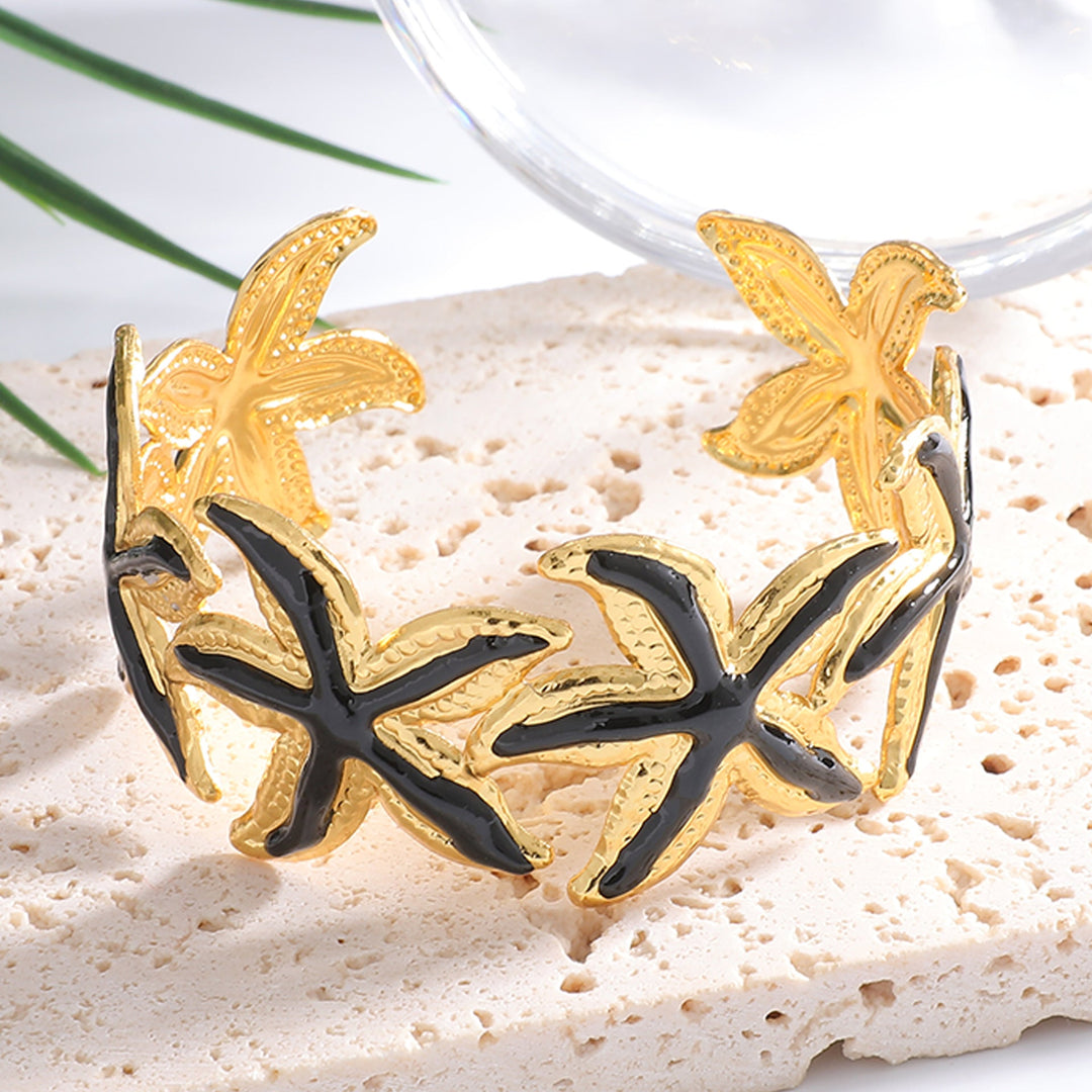 Women's Open Bangle with Striking Star Motif Nin Boutique
