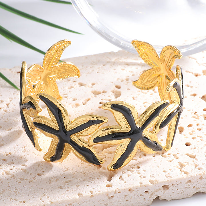 Women's Open Bangle with Striking Star Motif Nin Boutique