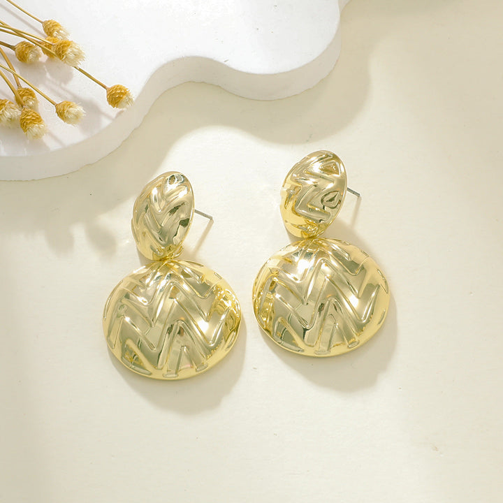 Ladies earrings in elegant relief design Nin Boutique