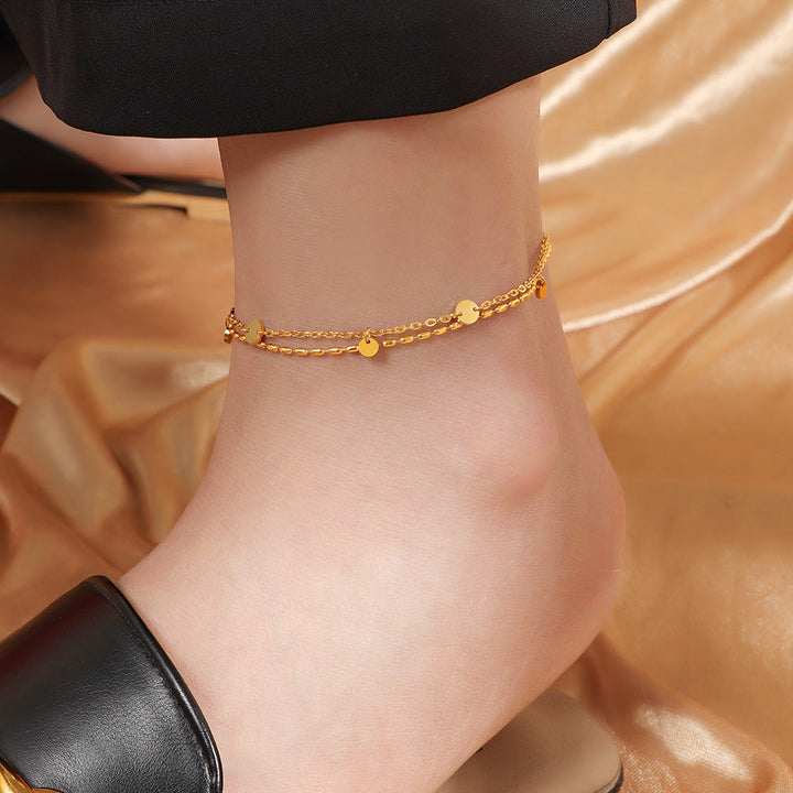 Women's ankle bracelet with delicate pendants and intricate design Nin Boutique