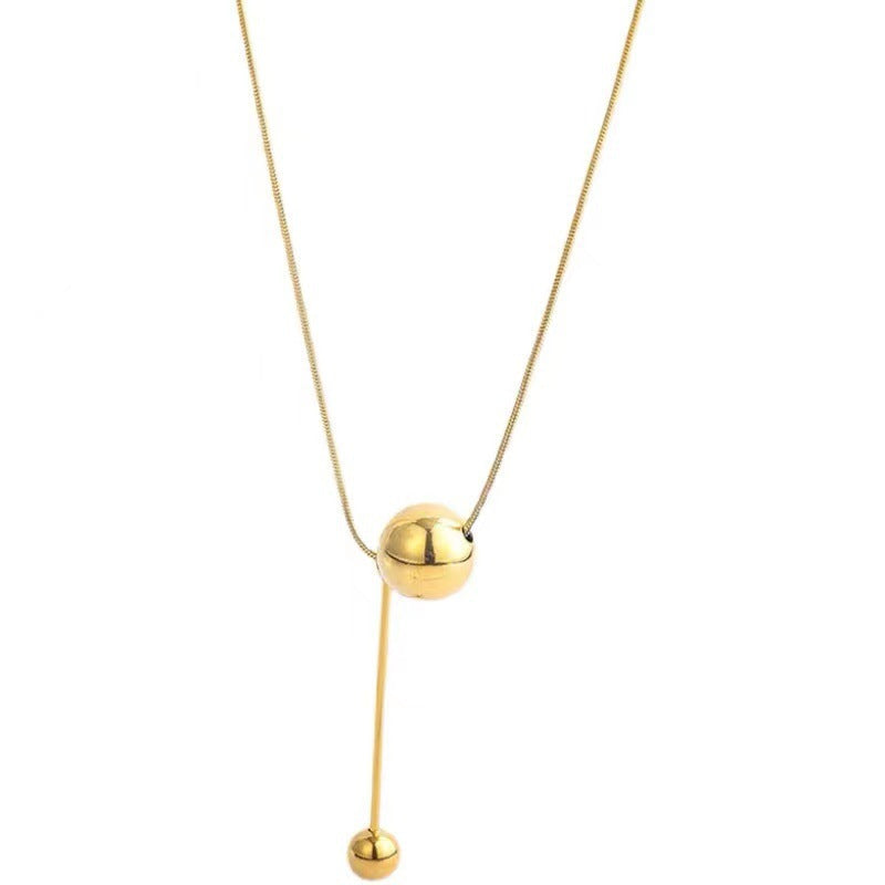 Women's necklace with modern, minimalist design and unique ball details Nin Boutique