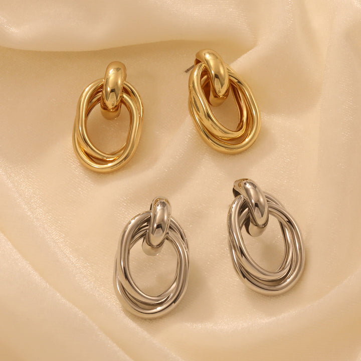 Ladies earrings with modern, curved design Nin Boutique