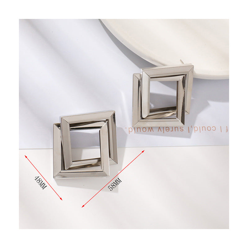 Ladies' earrings in contemporary square ring design Nin Boutique