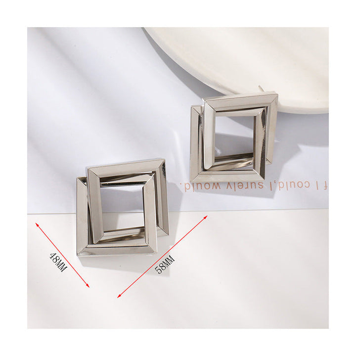 Ladies' earrings in contemporary square ring design Nin Boutique
