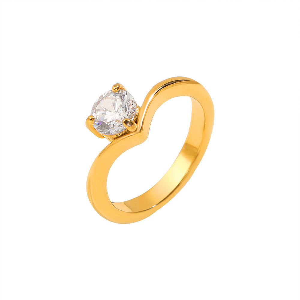 Ladies ring with elegant wave pattern and sparkling zirconia Nin Boutique