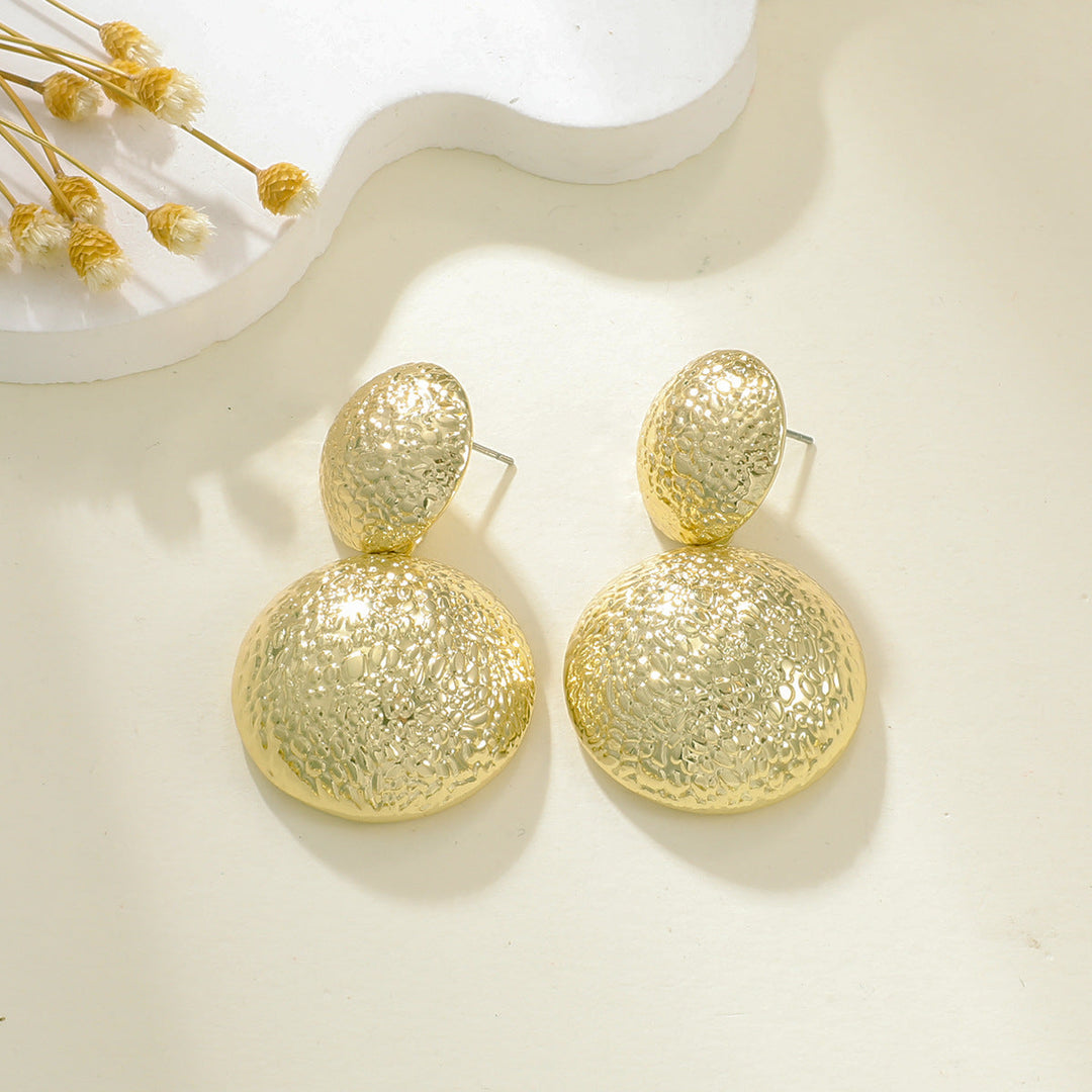 Ladies earrings in elegant relief design Nin Boutique