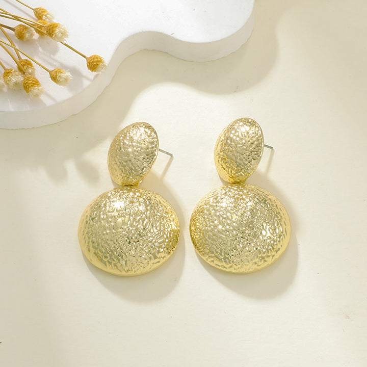 Ladies earrings in elegant relief design Nin Boutique