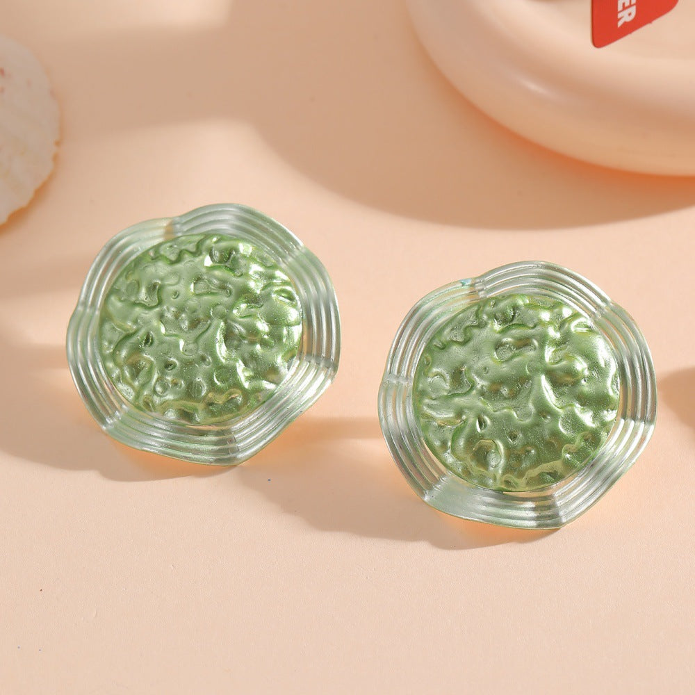Women’s earrings in a modern, wave-shaped design Nin Boutique
