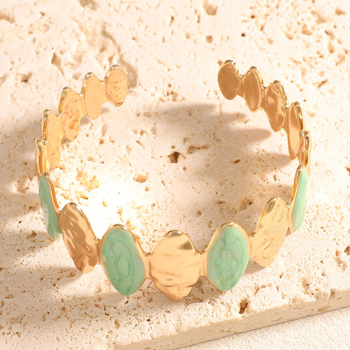 Women's Open Bangle made of fine metal with elegant motif Nin Boutique