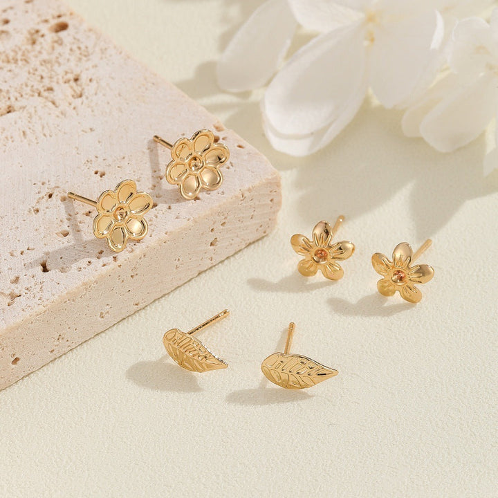 Women's earrings in floral design with intricate flowers and leaves Nin Boutique