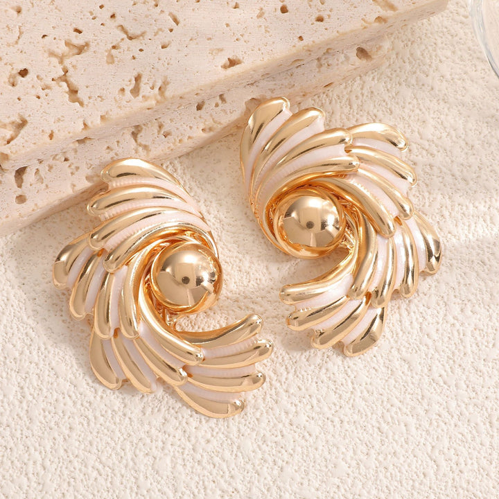 Ladies earrings with ornate wave pattern Nin Boutique