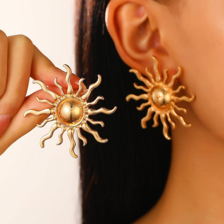 Ladies' earrings in artistic sun design Nin Boutique