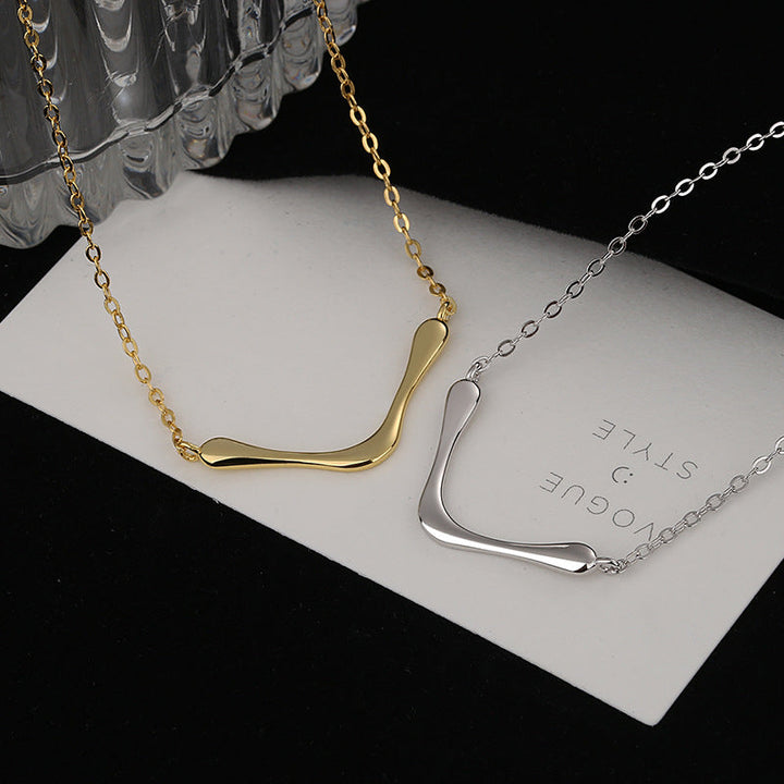 Women's necklace with modern, curved pendant Nin Boutique