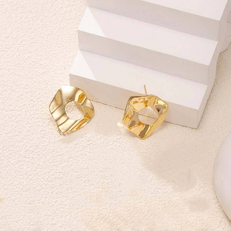 Ladies earrings in artistic face design Nin Boutique