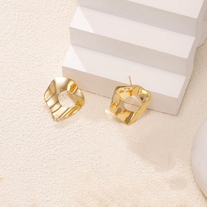 Ladies earrings in artistic face design Nin Boutique