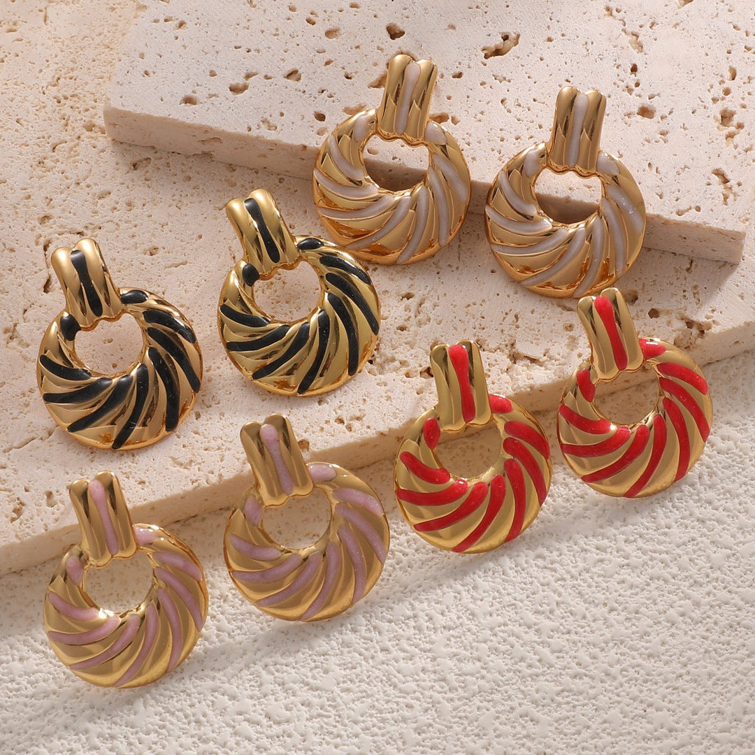 Women's earrings with elegant, sculptural design Nin Boutique
