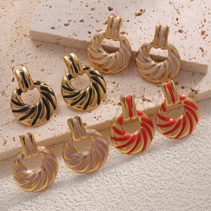 Women's earrings with elegant, sculptural design Nin Boutique
