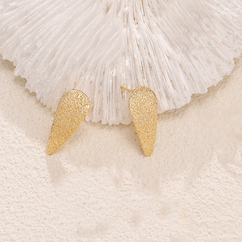 Ladies earrings in artistic face design Nin Boutique