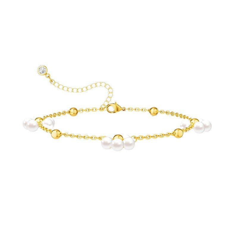 Women's ankle bracelet with elegant pearls and golden accents Nin Boutique