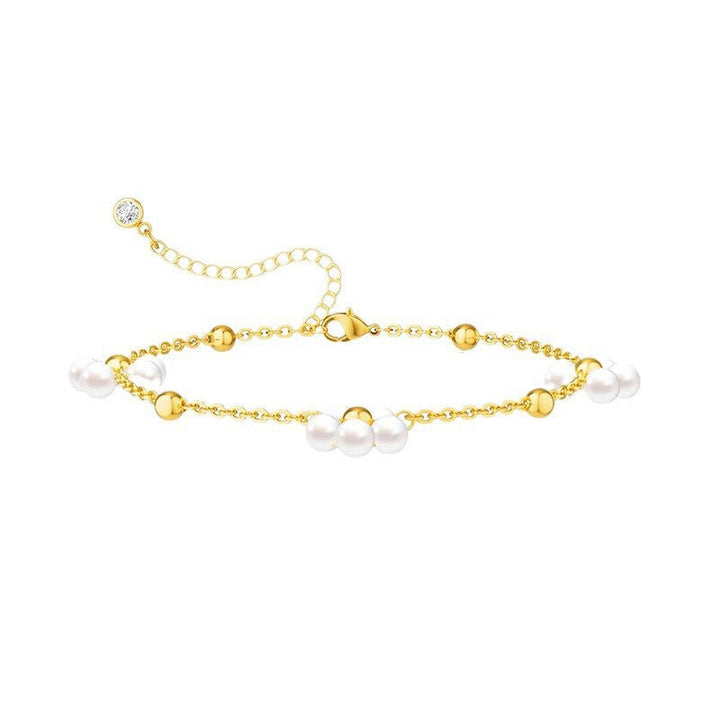 Women's ankle bracelet with elegant pearls and golden accents Nin Boutique