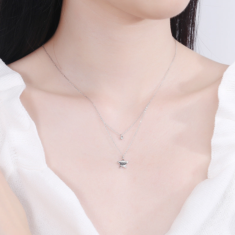 Ladies necklace with stylish star pendant and sparkling zircon Nin Boutique