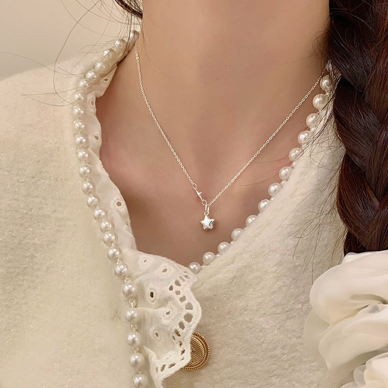 Women's necklace with sparkling star pendant and elegant connection details Nin Boutique