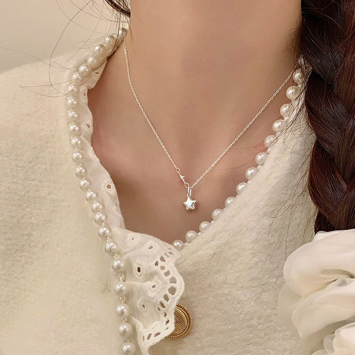 Women's necklace with sparkling star pendant and elegant connection details Nin Boutique