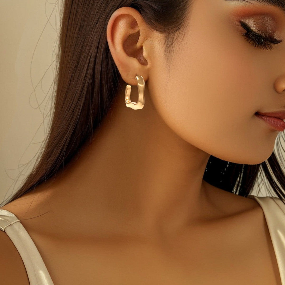 Women's earrings with modern wave design Nin Boutique