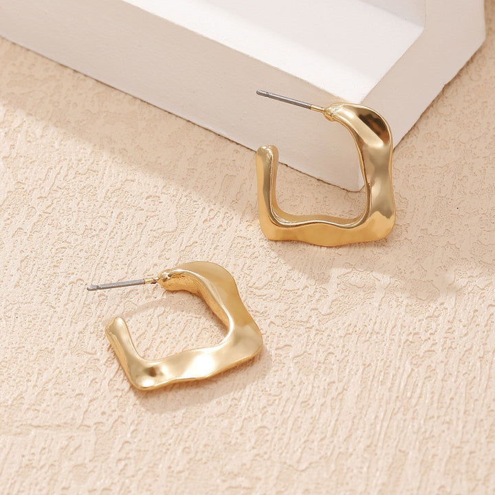 Women's earrings with modern wave design Nin Boutique