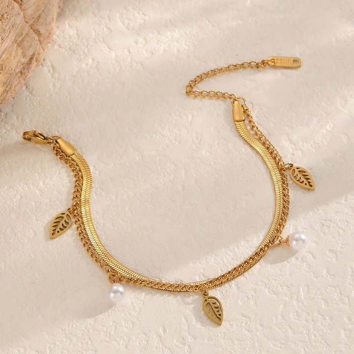 Ladies bracelet with filigree leaf design and pearls Nin Boutique